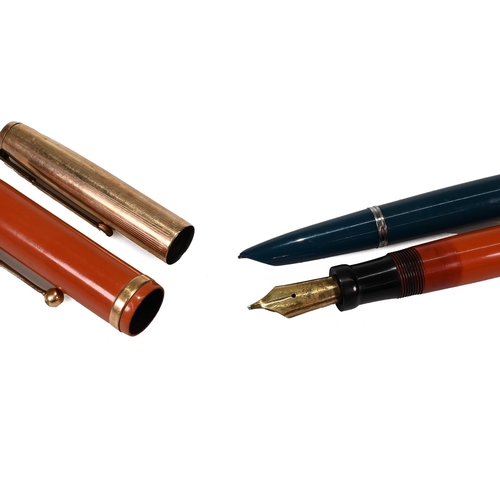 772 - Five Parker pens including an orange Duofold Lucky Curve, a Duofold Junior in green (circa 1965) and... 