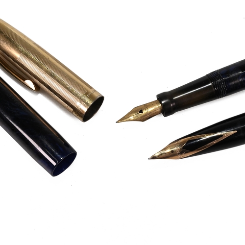 773 - A small collection of pens to include a Sheaffer White Dot with 14K gold nib, a Swan self-filler wit... 