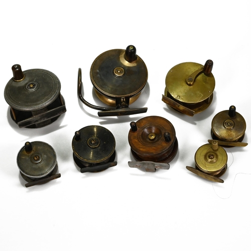 789 - A collection of eight fishing reels to include Mallooh's brass reel, A & N.C.P.L. small brass reel, ... 