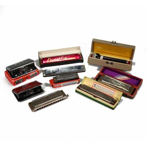 814 - A small collection of harmonicas to include Horner The Super Chromonica, along with folding opera gl... 