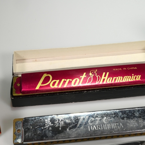 814 - A small collection of harmonicas to include Horner The Super Chromonica, along with folding opera gl... 