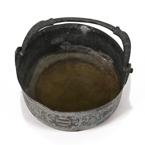 872 - A bronze or copper hanging pot with intricate chase-work design depicting dragons, dolphins, Celtic ... 