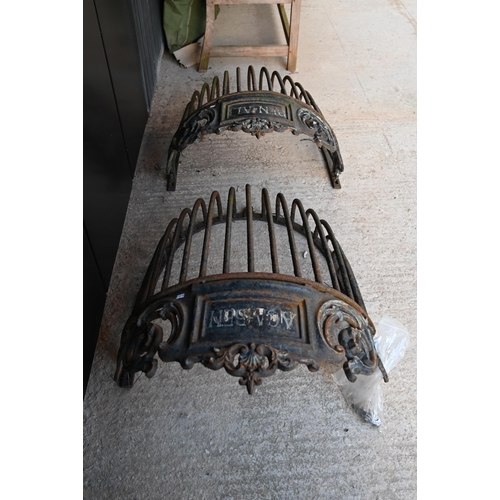 884 - A large pair of ornate cast iron hay racks or mangers dating from the 19th Century, one bearing the ... 