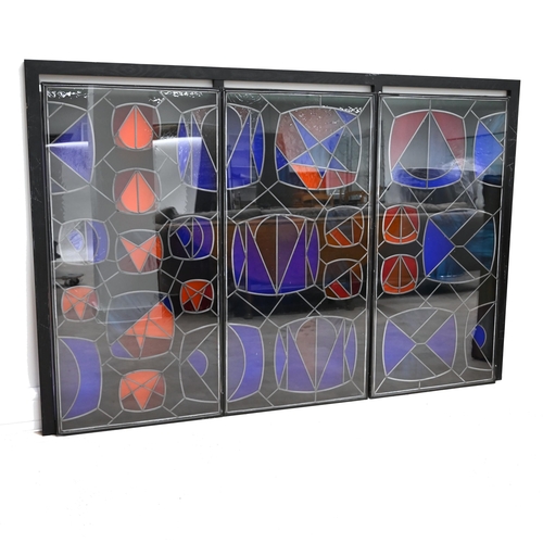 885 - A Trio of stained glass windows of Mackintosh Influence (3) with black painted wood surround c2014. ... 