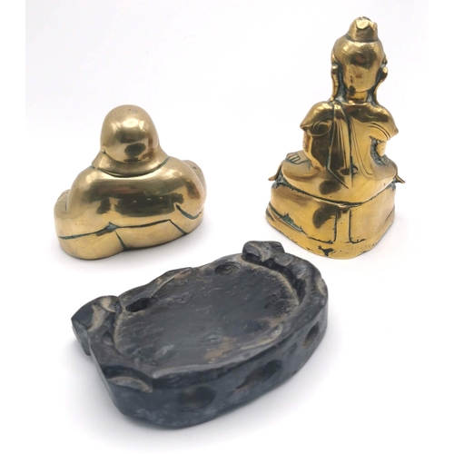 888 - Two brass Buddha's. The first a 19th Century polished brass Buddha seated in the Bhumisparsha mudra ... 