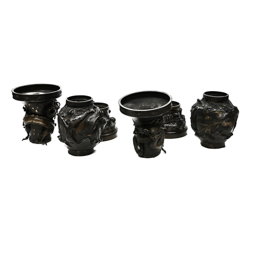 894 - A large pair of Japanese Meiji period bronze vases, each splitting in to three sections with the bas... 