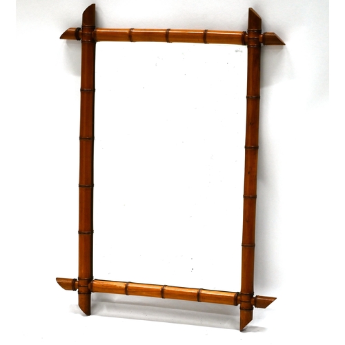 899 - A turn of the Century bamboo framed mirror, the glass measuring 46cm x 70cm, overall maxima 91cm x 6... 