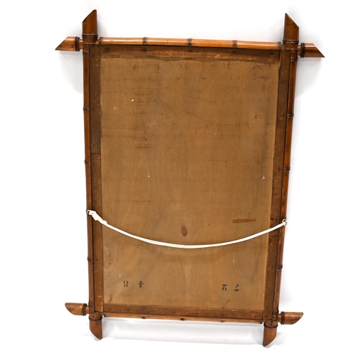 899 - A turn of the Century bamboo framed mirror, the glass measuring 46cm x 70cm, overall maxima 91cm x 6... 