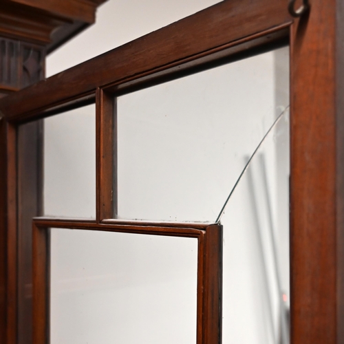 903 - A large late Victorian Mahogany breakfront bookcase marked for Waring & Gillow c1890s. Panelled cupb... 