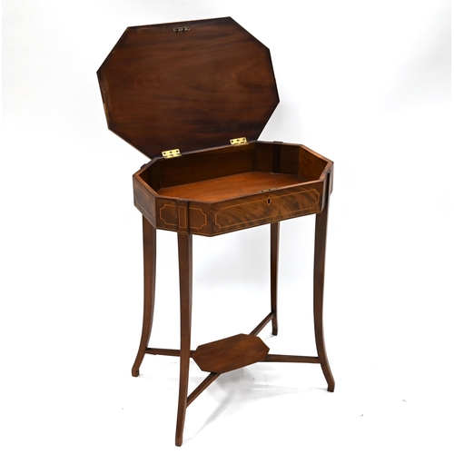 915 - An early 20th Century Mahogany sewing or cutlery table with boxwood inlay. The top lifts to reveal a... 