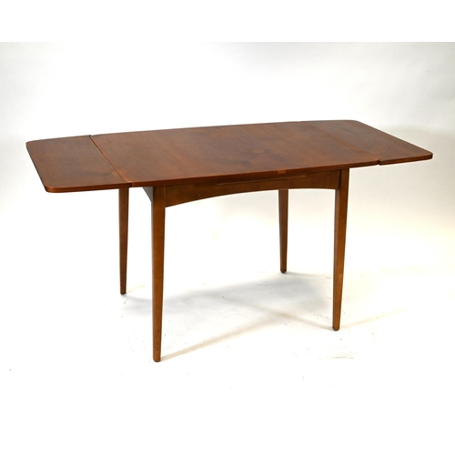 922 - A Mid Century Teak & Beech Dining Table and four upholstered chairs (4) c1960s. No maker's mark but ... 