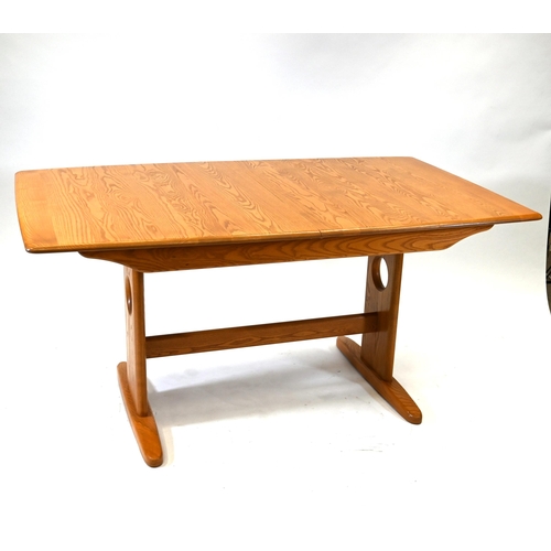 923 - An Ercol Windsor (model 1193) light Elm 6-8 seater extending dining table. W 92cm, H 73cm, L 150cm c... 