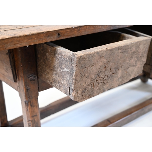 931 - A Country style preparation or scullery table with chamfered legs, rectangular top and three drawers... 