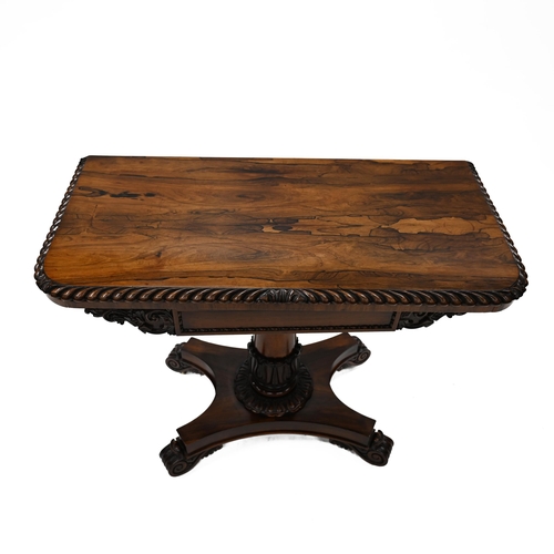 936 - A William IV rosewood folding card table with carved scrolled edge with acanthus leaf details to the... 