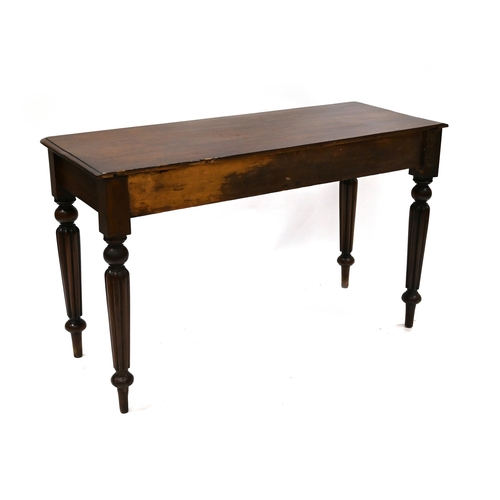 937 - Mid 19th Century Mahogany side table with deep reeded legs and two drawers. W 123cm, D 50cm, H 75cm.