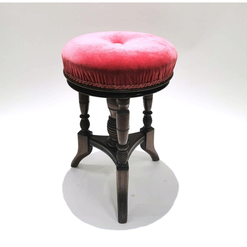 939 - An Aesthetic Period adjustable Mahogany Piano Stool. With upholstered seat and turned spindles, this... 