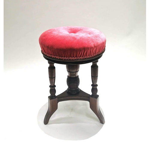 939 - An Aesthetic Period adjustable Mahogany Piano Stool. With upholstered seat and turned spindles, this... 