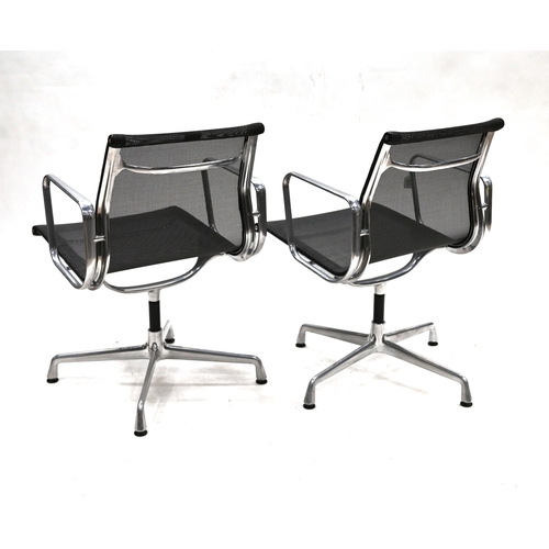 943 - Pair (2) of Vitra Eames Aluminium Group EA108 chairs c2008. Dark grey net weave seat and back over p... 