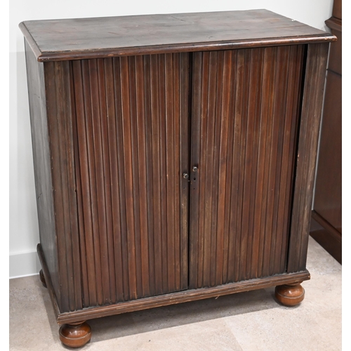 975 - An early 19th Century Mahogany tambour fronted Collectors or Specimen cabinet. Interior fitted as 24... 