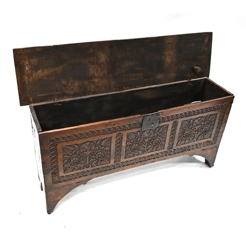 984 - A late 17th Century and later Oak 6 plank coffer with carved decoration to the front. Staple - hinge... 