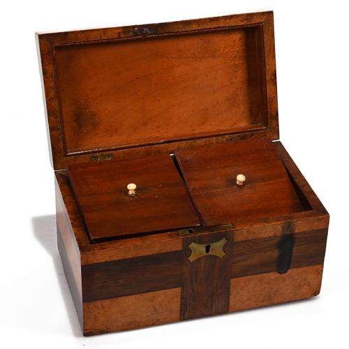 986 - A small two compartment late Victorian tea caddy of burr walnut and cross and rosewood veneer in a c... 