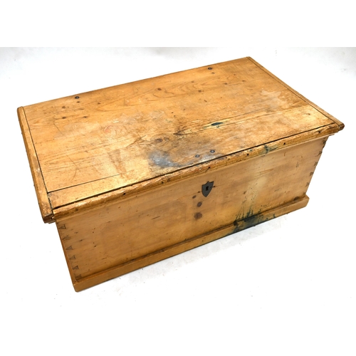 988 - A large sized 19th Century stripped pine trunk with iron handles and hinges. Opens to reveal large o... 