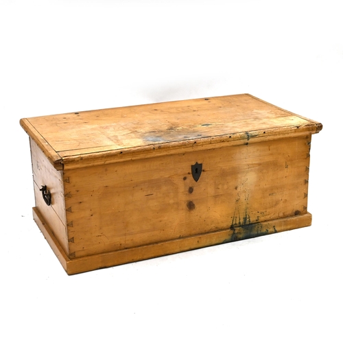 988 - A large sized 19th Century stripped pine trunk with iron handles and hinges. Opens to reveal large o... 