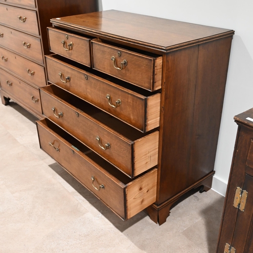 992 - A late Georgian Oak chest of 2 over 3 drawers with brass handles.  W 100cm, D 51cm, H 102cm.