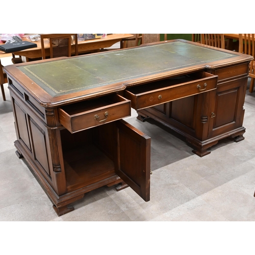 994 - A Victorian revival walnut partners desk with pilaster detailing and green leather skiver c1960's. N... 