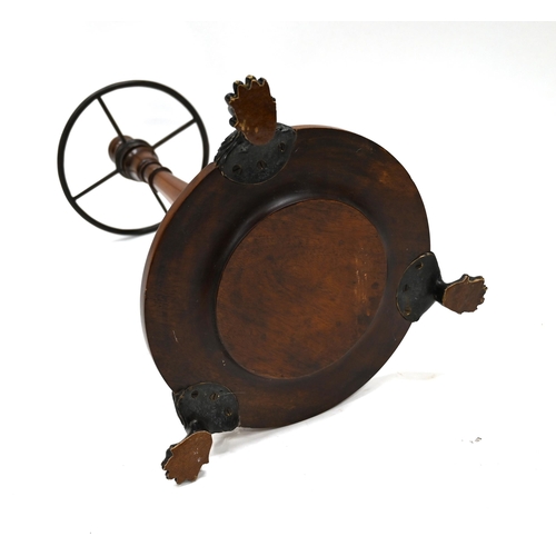 996 - A mahogany and bronze Victorian Stick Stand of circular form, the  circular base supported on three ... 