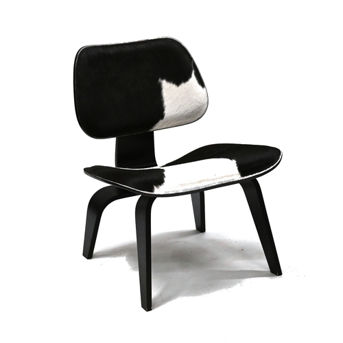 946 - A Vitra Eames LCW Calf's skin lounge chair with black Ash frame.  Designed by Charles & Ray Eames in... 