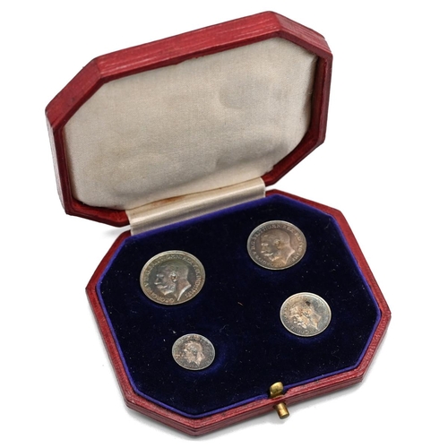 242 - 1912 King George V silver four-coin Maundy Money set in dated box with royal arms to the lid. Includ... 