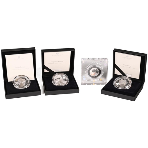 310 - Group of four (4) Royal Mint Harry Potter 25 Years of Magic collection silver proof coins. Includes ... 