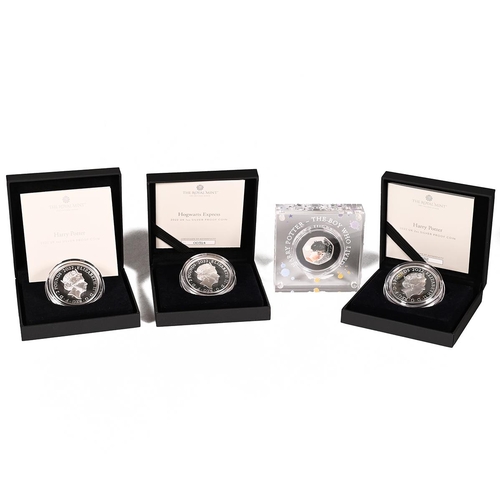 310 - Group of four (4) Royal Mint Harry Potter 25 Years of Magic collection silver proof coins. Includes ... 