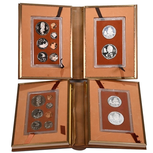 360 - Group of two (2) 1973 and 1974 Cook Islands low mintage proof sets with book-style cases. Includes (... 