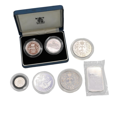 125 - Group of six (6) silver coins, sets and a bar weighing 148.7g collectively. Includes (1) Royal Mint ... 