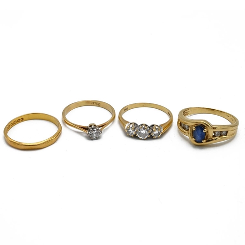 20 - An 18ct gold three diamond ring, along with an 18ct gold dress ring, 18ct gold ring single stone dia... 