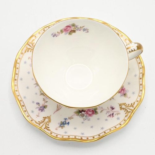 200 - A Royal Crown Derby Royal Antoinette pattern cup and saucer and a pair of  Royal Crown Derby cutlery... 