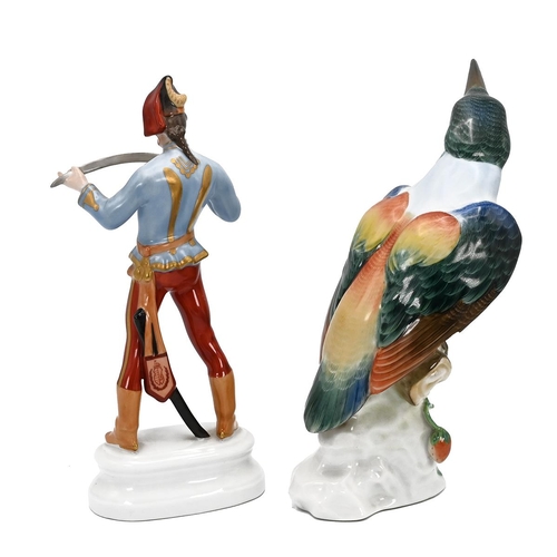 209 - A Herend figurine of a Magyar with sword and a Herend figurine of a Kingfisher (losses to beak and w... 