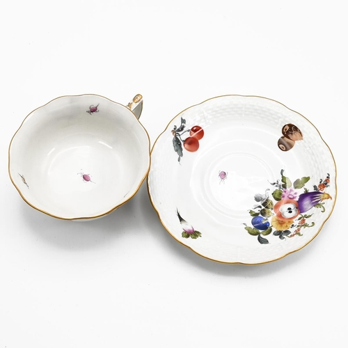 210 - Two Herend fruit and flowers patterned plates and a similar cup and saucer. (4)