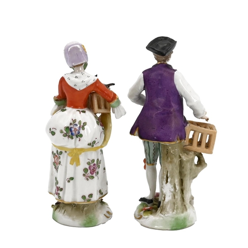 211 - A pair of Ludwigsburg (1758-1824) porcelain figurines of bird sellers with marks to the underside. T... 