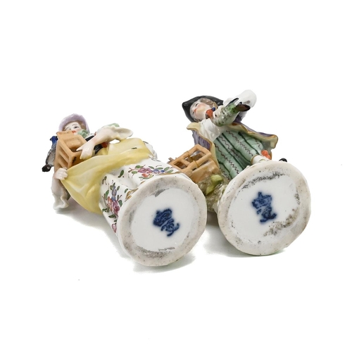 211 - A pair of Ludwigsburg (1758-1824) porcelain figurines of bird sellers with marks to the underside. T... 