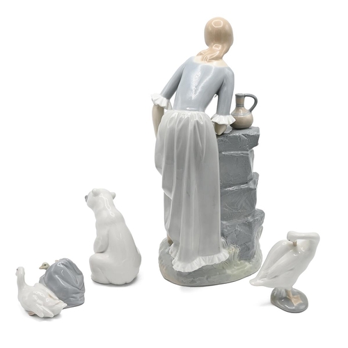 221 - Collection of Lladro to include: Nao by Ladro model 02010115 - Girl by Fountain (height 34cm); seate... 