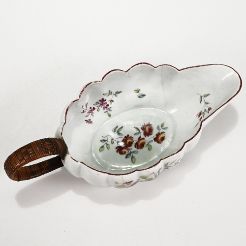 222 - A Derby sauceboat, circa 1760, with scalloped rim, fluted sides, floral decoration to bowl's inner a... 