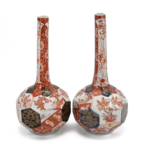 223 - Pair of Meiji Period Japanese Imari Bottle Vases with octagonal faceted bowls and slender tapering n... 