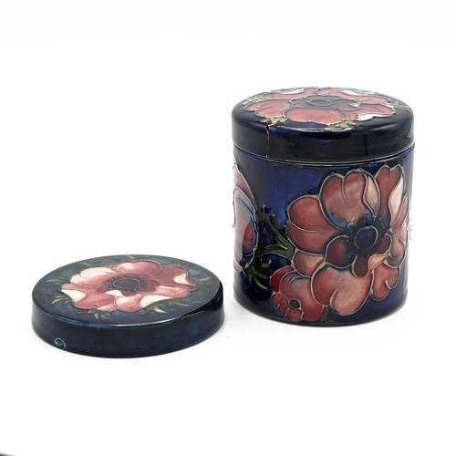 226 - Moorcroft Anemone on blue ground lidded pot, mid 20th century. Lid bears old repair. There is a spar... 