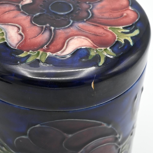 226 - Moorcroft Anemone on blue ground lidded pot, mid 20th century. Lid bears old repair. There is a spar... 