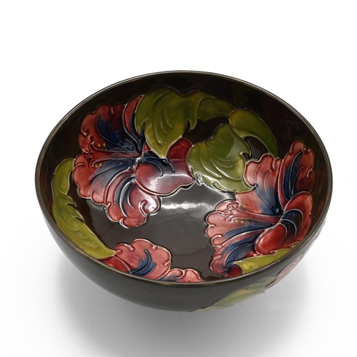 227 - Moorcroft flambe Hibiscus bowl with unusual brown ground, signed WM to base with impressed Moorcroft... 