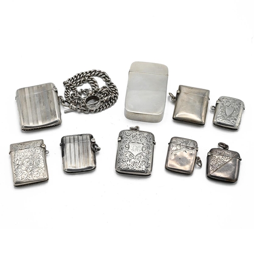 23 - A collection of 8 silver vesta cases, along with a silver fob chain and silver case with a plastic i... 