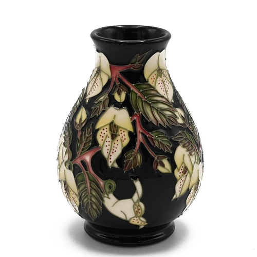 239 - Moorcroft Mountain Gold vase by Sian Leeper, 2003. Shape/Size: 7/5. Height 13.5cm, Diameter 9.5cm.